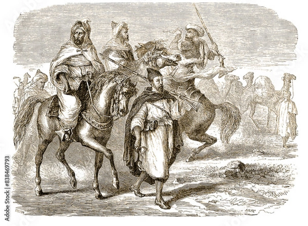 Fototapeta Caravan traveling through the deserts of Morocco