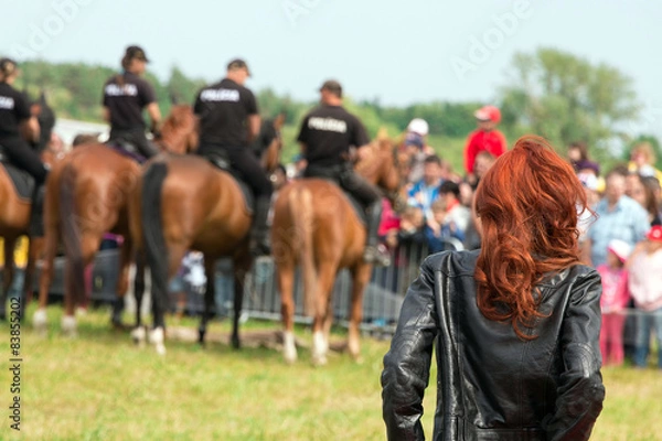 Obraz Mounted police control protesting crowd
