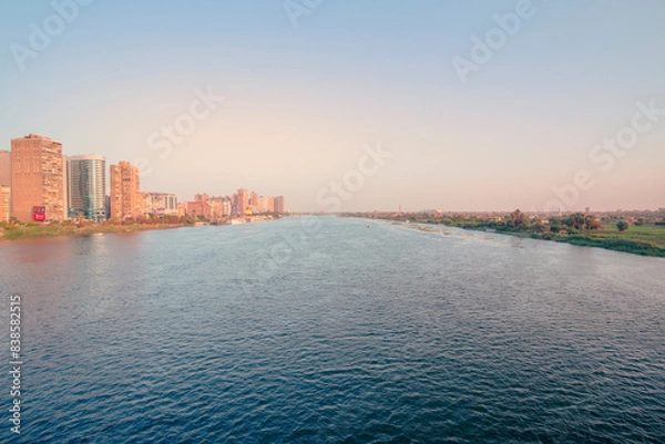 Fototapeta Nile River View, Cairo, Egypt, Buildings on the Left Bank and Green Fields on the Right Bank