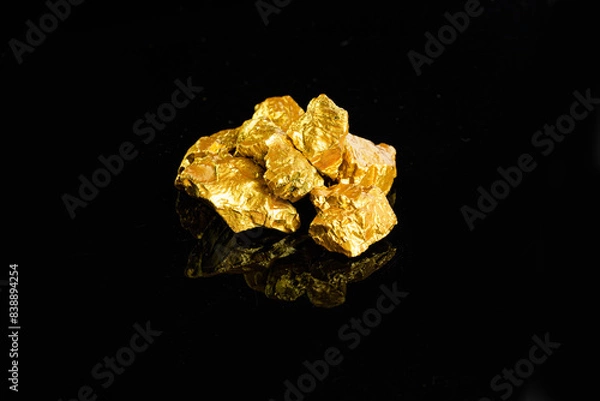 Fototapeta Closeup of big gold nugget finance concept