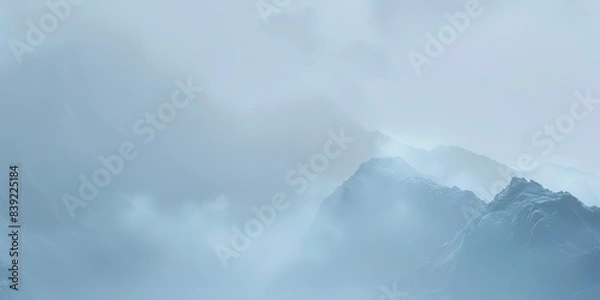 Fototapeta Mountain summit enveloped in fog, close-up on faint outlines of rocks, cool, subdued morning light. 