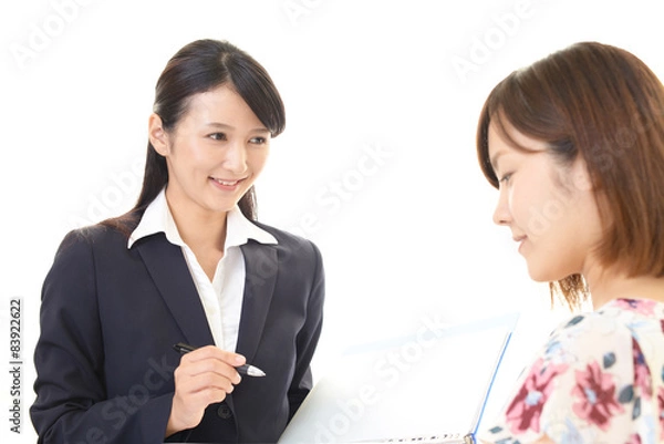 Fototapeta 接客をする女性