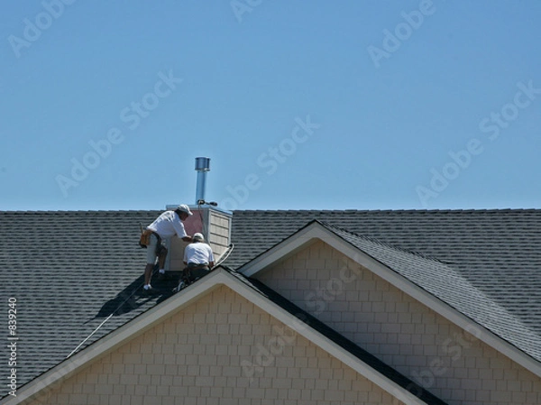 Obraz men working on roof