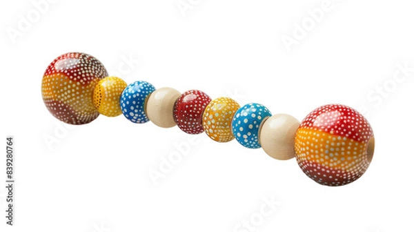 Fototapeta A colorful wooden bead string with a dotted pattern