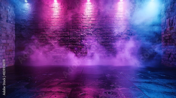 Fototapeta An atmospheric empty stage with vibrant pink and blue lighting casting colorful reflections against a brick wall and mist creating a dramatic ambiance.