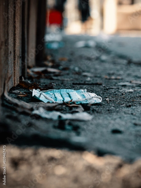 Obraz Disposable mask left on ground