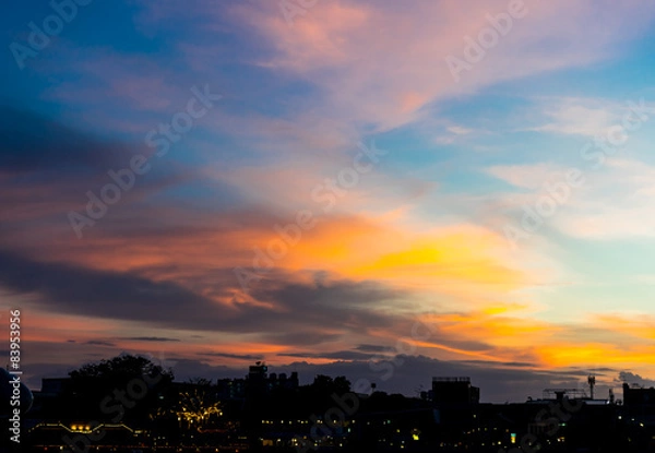 Obraz Sunset sky and cloud with siluate city scape