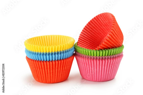 Fototapeta Empty colorful cupcake cases isolated on white