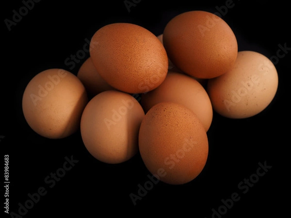 Obraz Eggs on a black background