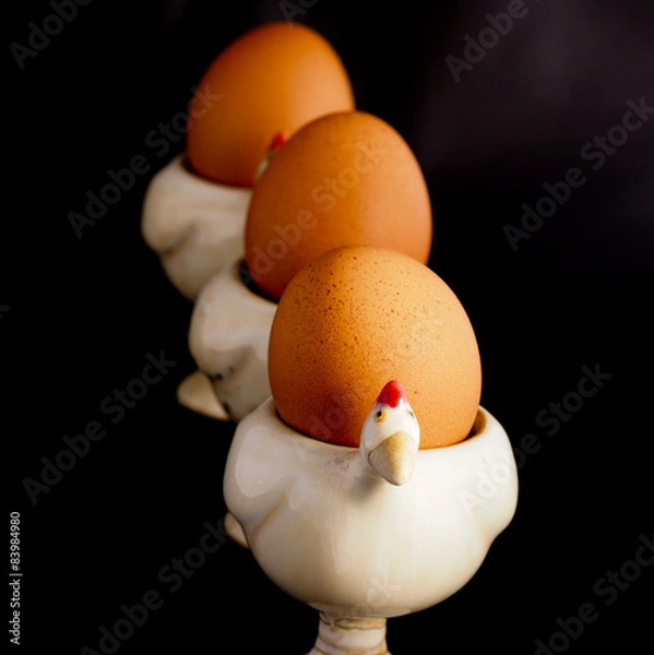 Obraz Three eggs on the egg cup