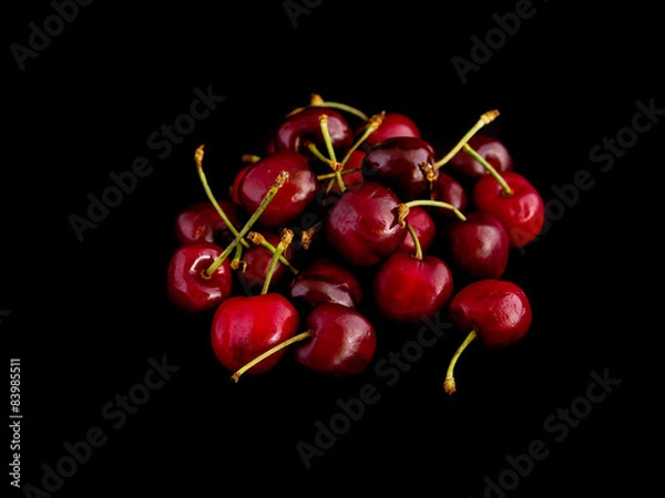 Obraz Cherries on a black background