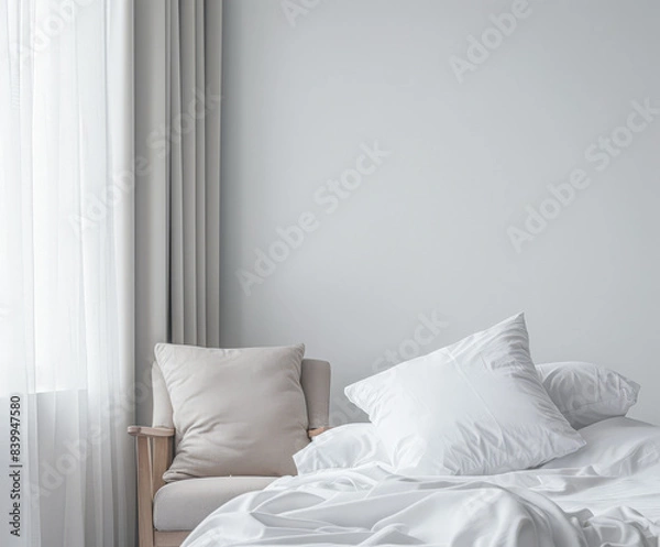 Fototapeta Modern hotel room with elegant bedding and stylish decor. Neutral tones and use of natural light.
