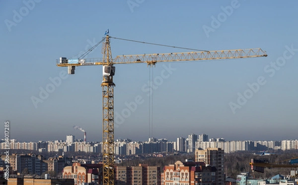 Fototapeta Crane and building construction site