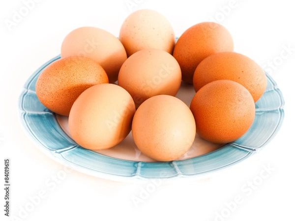 Obraz Dish with eggs on white background