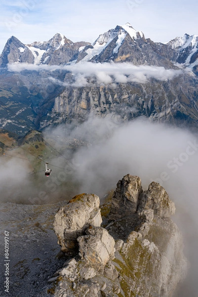 Fototapeta High mountain peaks range covered with snow in Switzerland. Swiss Alps and Lauterbrunnen valley