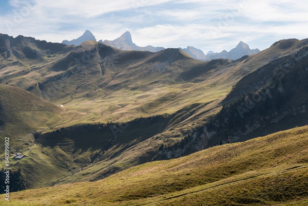 Fototapeta People walking on a ridge of a mountain in Stoos, Switzerland. Swiss Alps iconic aerial view
