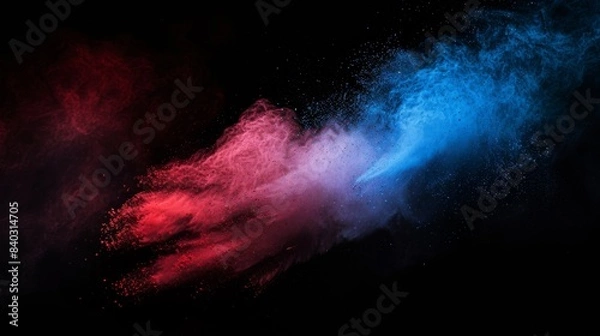 Fototapeta Blue and Red color powder explosion on black background. Colored cloud. Colorful dust explode. Paint Holi.