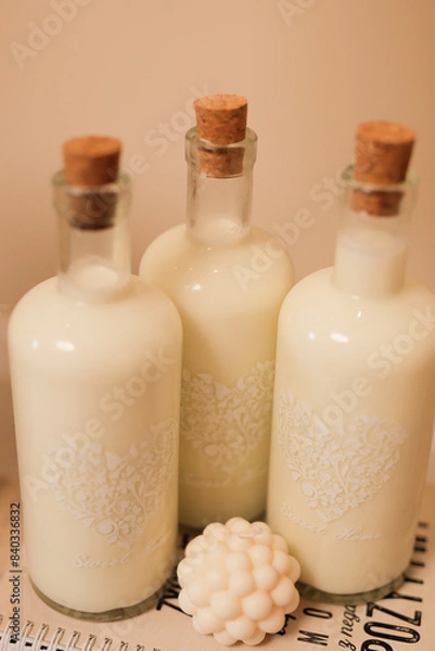 Obraz butelki z mlekiem