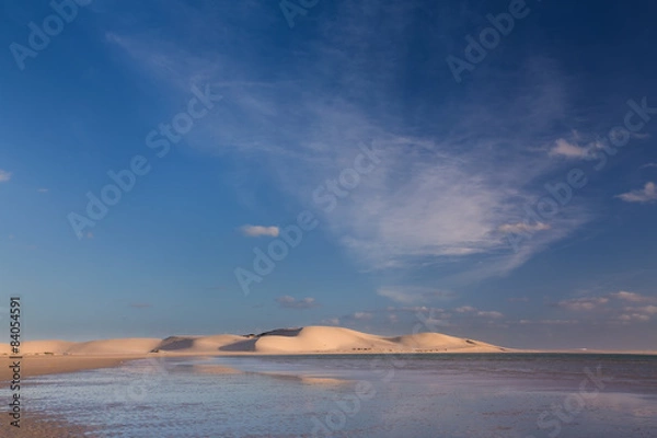 Obraz Glorious sand dune in the distance over empty tidal lagoon