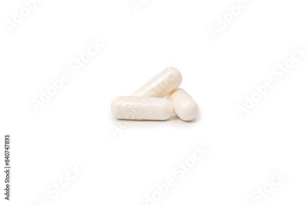 Obraz White pill capsule isolated on a white background.
