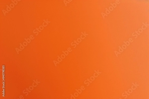 Obraz Vibrant orange background for text or graphics, with a smooth surface and uniform color