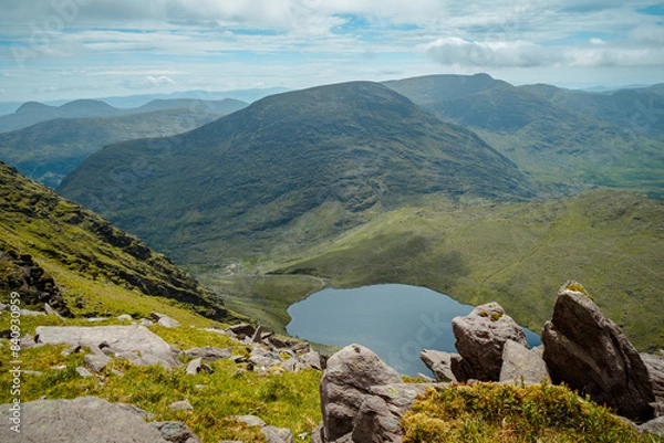 Fototapeta Panoramic view of Curraghmore Lake from Devils Ladder, one of most difficult trails, that is leading to highest Irish mountain Carrauntoohill or Carrantuohill is the highest mountain in Ireland