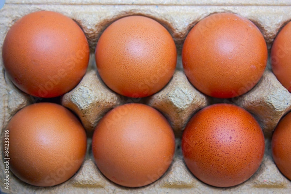 Obraz Chicken eggs in a paper box