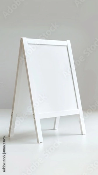 Fototapeta A blank and clean white A-frame sign for customization