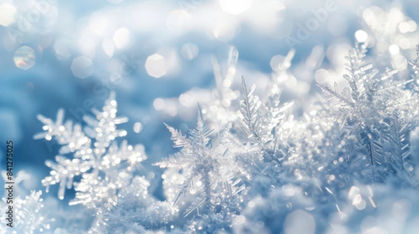 Fototapeta A close-up view of snowflakes, intricate ice crystals in sharp focus, delicate glistening ice formations, blurred snowy background