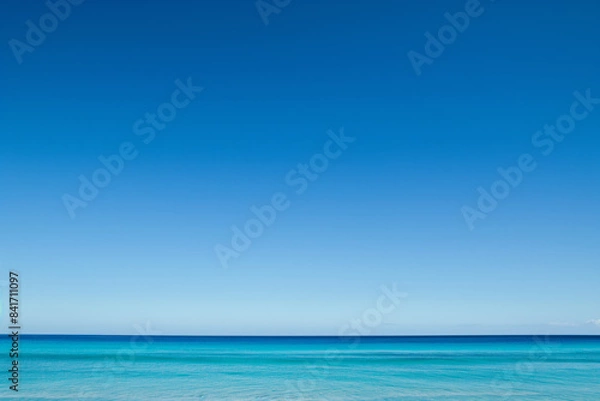 Fototapeta The clear blue sky without clouds. A natural background for images. Sea