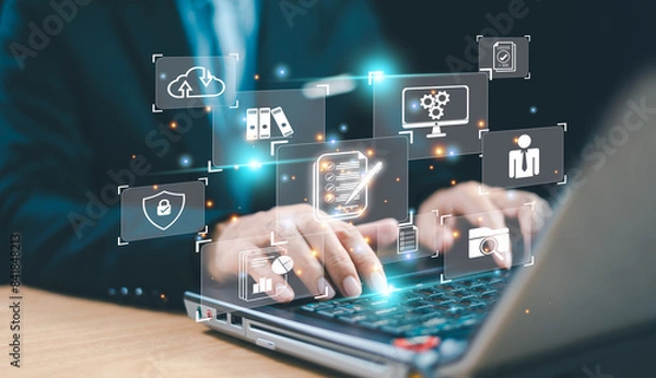 Obraz Document management system services concept. Business database electronic document, online data storage network. Businessman working on a laptop with document management icon, Online file technology