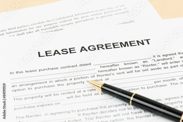 Obraz Lease agreement with pen; document is mock-up