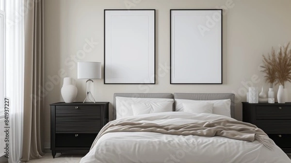 Fototapeta Modern Minimalist Bedroom Mock-Up with Blank Frames Above Bed for Design Display. Perfect for showcasing posters, artwork, or photo frames in a stylish, minimalist bedroom setting