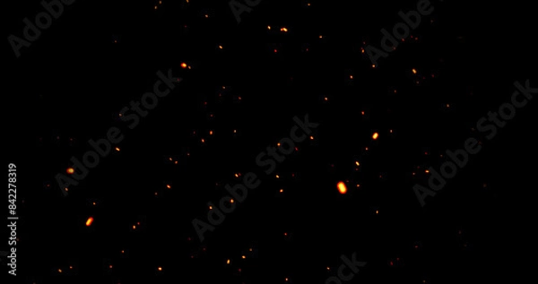 Fototapeta Realistic surreal ember fire dust slowing rising up on black bg. Grunge dark fire sparks flying isolated dark background. Overlay spark tiny flake burning. Hell rising burst inferno. Ember on black.