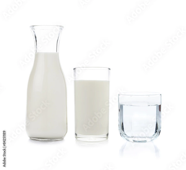 Fototapeta Glass and bottle of milk and drinking water on white background
