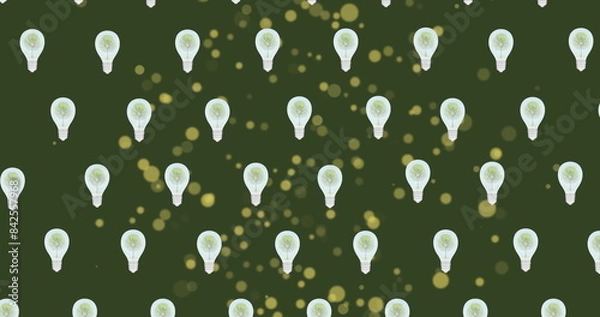 Fototapeta Image of lightbulbs and green spots on green background