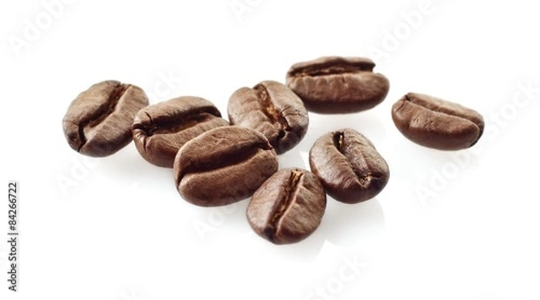Obraz Scattered coffee beans on white