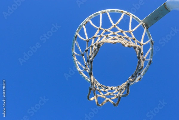 Obraz netball hoop against blue sky