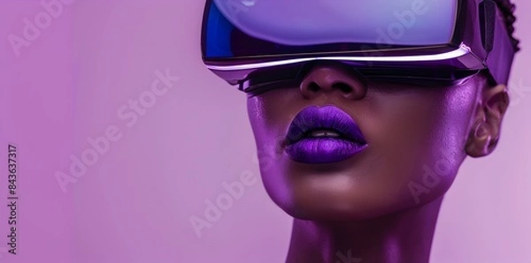 Obraz Portrait of young woman is putting on VR glasses, close up photo. technology, unreal world, surreal, metallic purple color tier, copy space.