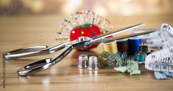 Obraz Sewing with color threads, meter and scissors