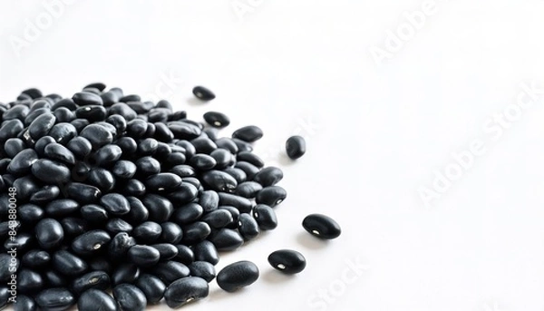 Fototapeta Black turtle bean, a variety of common bean - Phaseolus vulgaris - in Latin American cuisine commonly served with rice as a side dish. Isolated on white background
