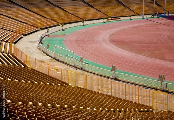 Fototapeta Empty seats on football stadium