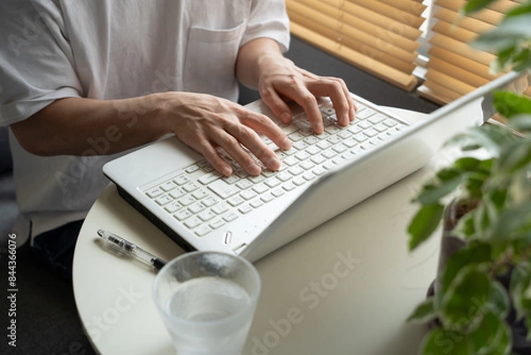 Obraz ビジネス　パソコンを打つ男性