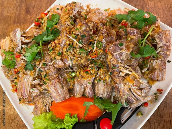 Fototapeta Fried crayfish with garlic and pepper
