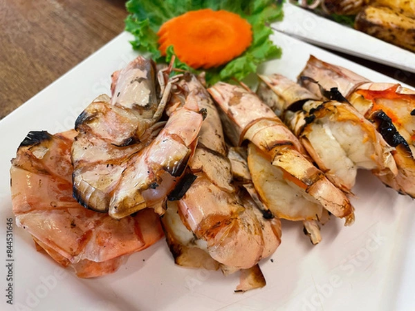 Fototapeta Grilled tiger prawns served on a plate