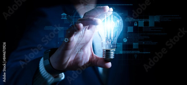 Fototapeta success businessman hold light bulb for good idea.brainstorming creative. Idea innovation and inspiration concept creativity with bulbs that shine, success moment and get the best idea to pass problem