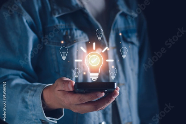 Fototapeta Business solution idea concept. Businessman  creative light bulbs with marketing network, planning strategy, analysis solution and development, modern business technology, Innovative of new idea.