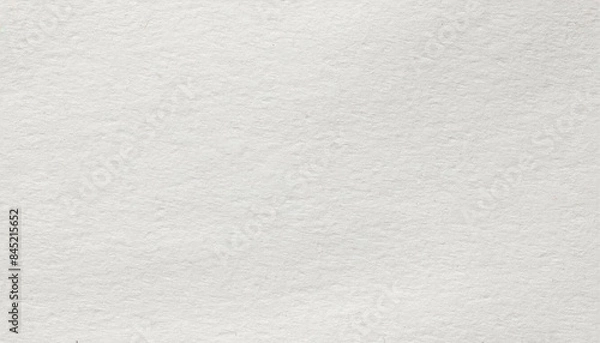 Fototapeta Close-up of watercolor paper texture with grainy surface, drawing, artistic art supplies and fine arts.