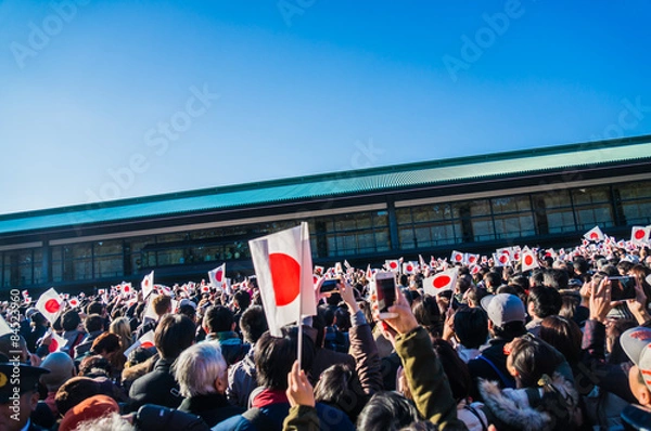 Obraz People holding Japanese flag in hand