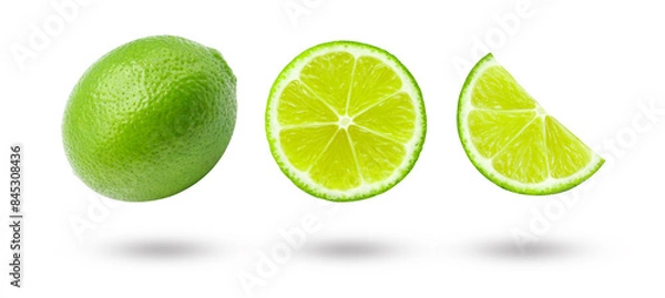 Obraz Flying green lemon with slices and shadow isolated on white background , clipping path.